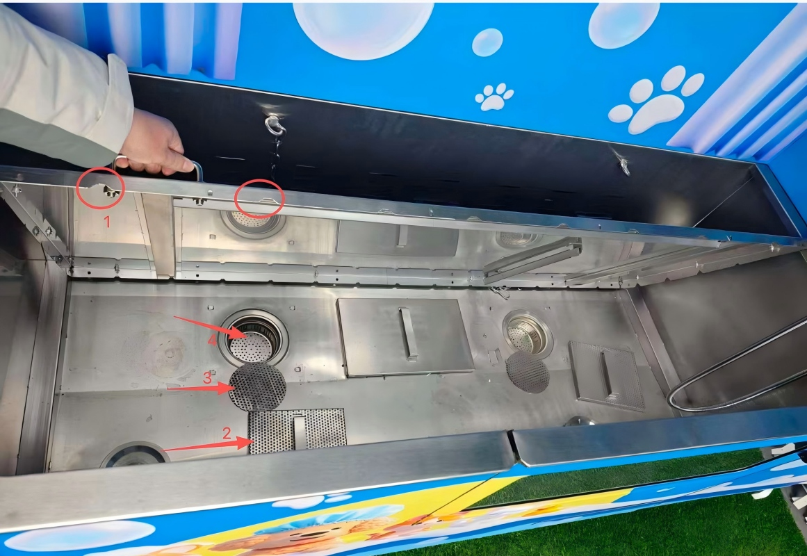 Four-stage hair and debris filtration system inside a smart dog washing machine, showing multiple filters designed to remove pet hair and impurities.